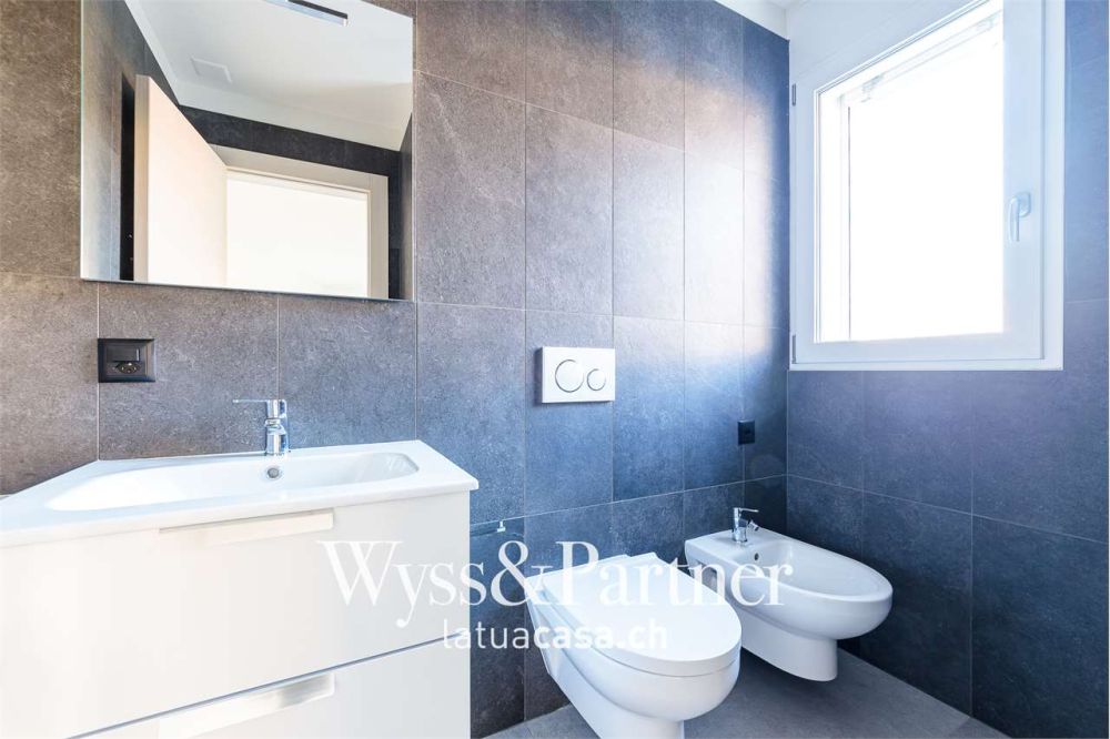 Claro, nuovo appartamento 3.5 con giardino - Bild 5