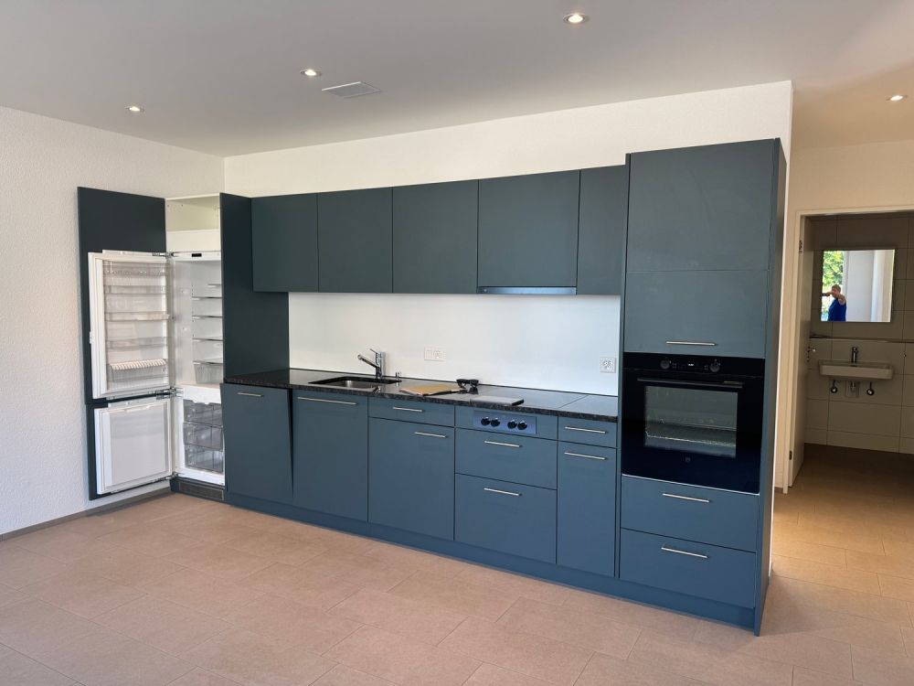 Zentralgelegene, moderne 2.5 Zimmerwohnung im EG in Pfeffingen - Küche