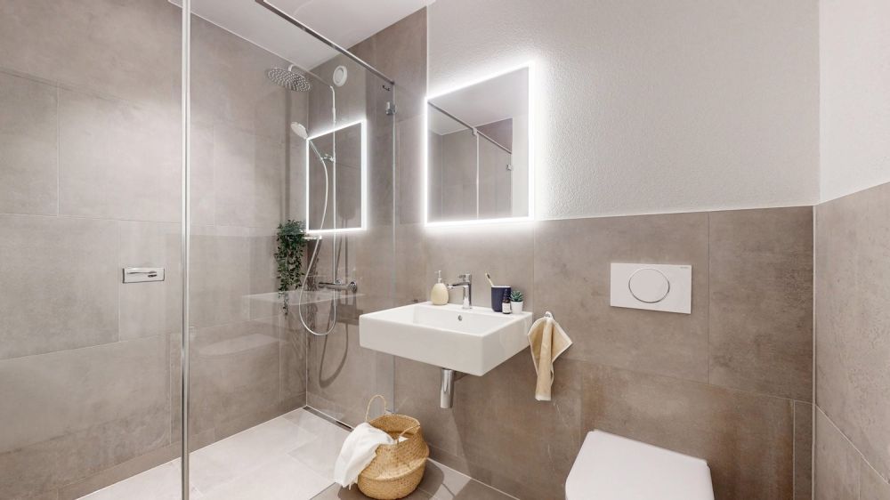 Neu & Zentral - 1.5-Zimmerwohnung im Erstbezug mit Gartensitzplatz - Badezimmer (3.5-Zimmer-Musterwohnung)