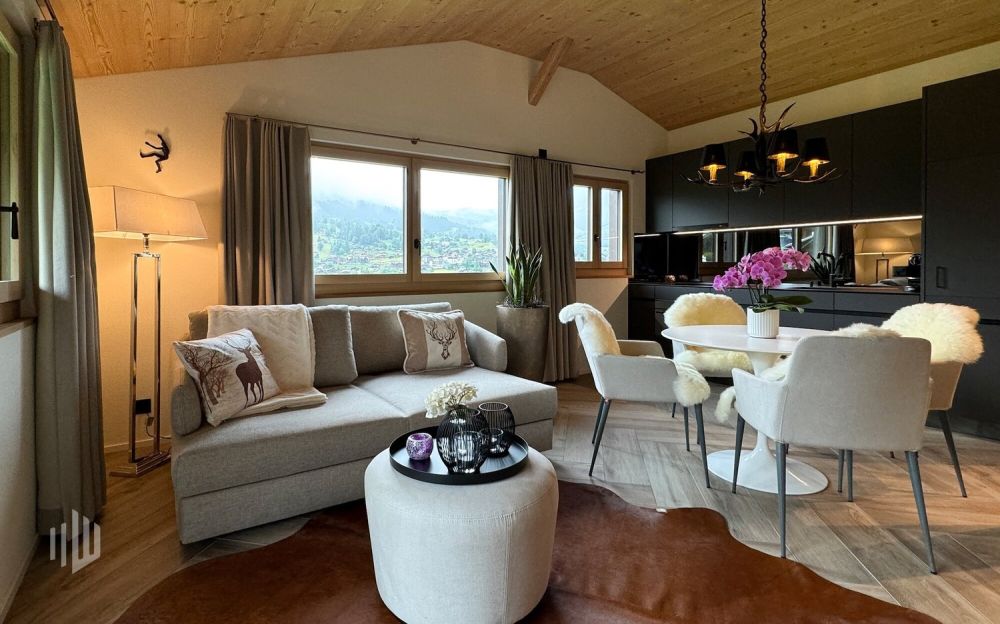 ImmoWyss -  Alleinstehendes (Ferien-) Chalet unter der Eigernordwand - Wohnbereich, gemütliches Sofa für 2 Personen