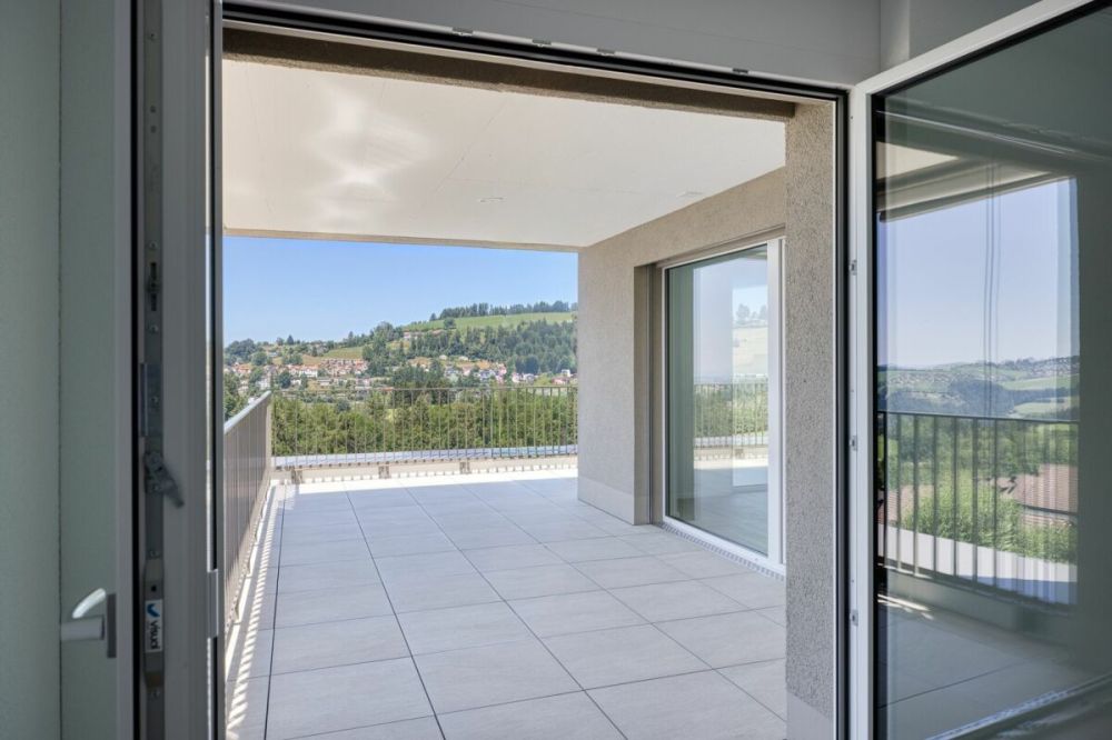 NEUBAU - Exklusive 4.5-Zimmer-Attikawohnung mit grosszügiger Terrasse und wunderschöner Aussicht - Bild 2