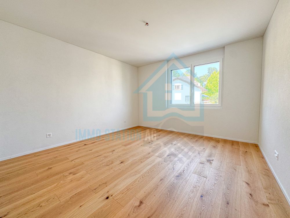 Neuwertige 3.5-Zimmer-Neubauwohnung mit Balkon und Top-Ausstattung - Zimmer 1