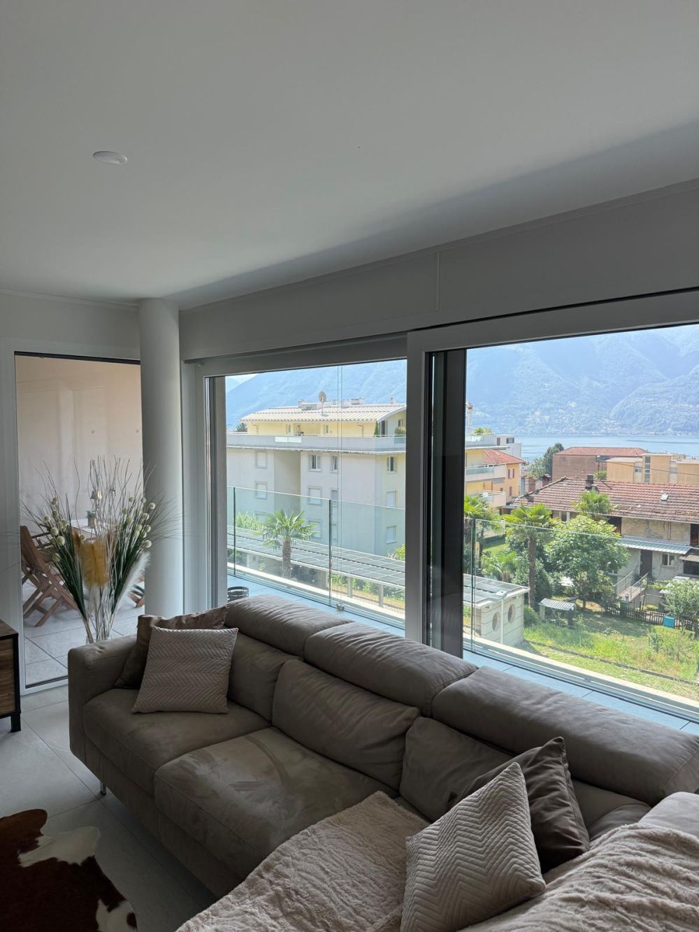 Appartamento di 72 m² con ampia terrazza e splendida vista lago a Minusio - Bild 1