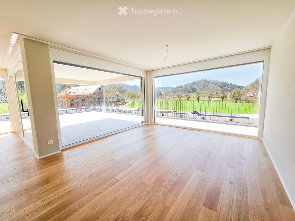 Luxuriöse 4.5-Zimmer Neubauwohnung an idyllischer Lage - Bild 1