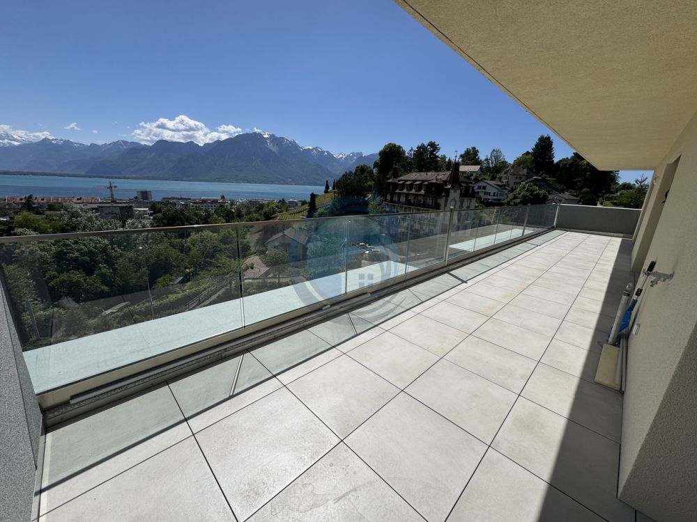 APPARTEMENT DE 2,5 PIÈCES EN ATTIQUE AVEC VUE PANORAMIQUE SUR LE LAC - Bild 9