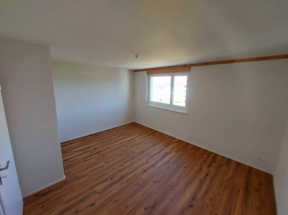 Exklusive 2.5-Zimmer-Attikawohnung mit ca. 74 m² Sonnenterrasse - Erstbezug im Neubau - Bild 11