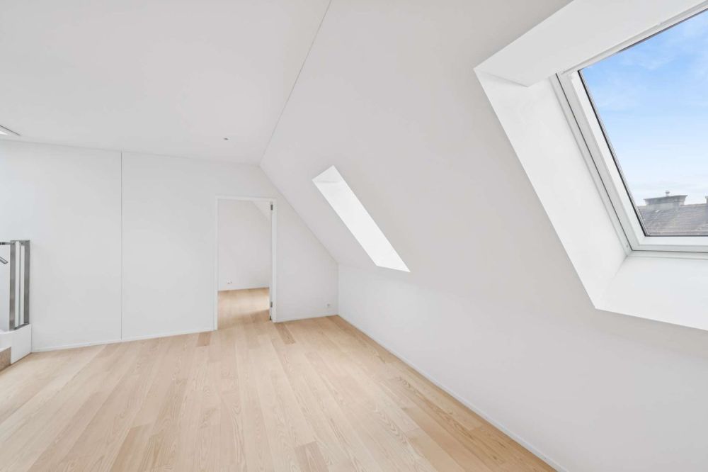 Erstbezug - Moderne Dachwohnung mit privater Terrasse und Seeblick - Wohnen