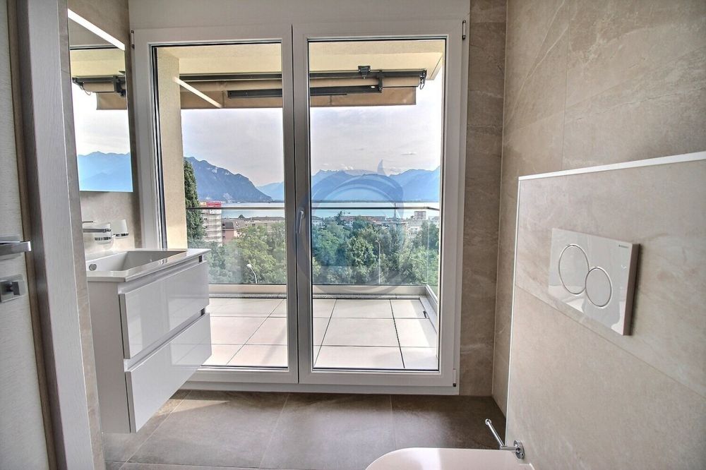 APPARTEMENT NEUF DE 4,5 PIÈCES AVEC VUE PANORAMIQUE SUR LE LAC - Bild 9