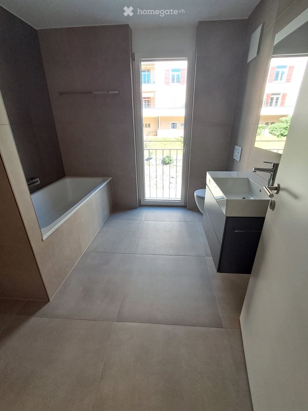 Appartement de 4,5 pièces dans un immeuble neuf à Neuchâtel - Bild 1