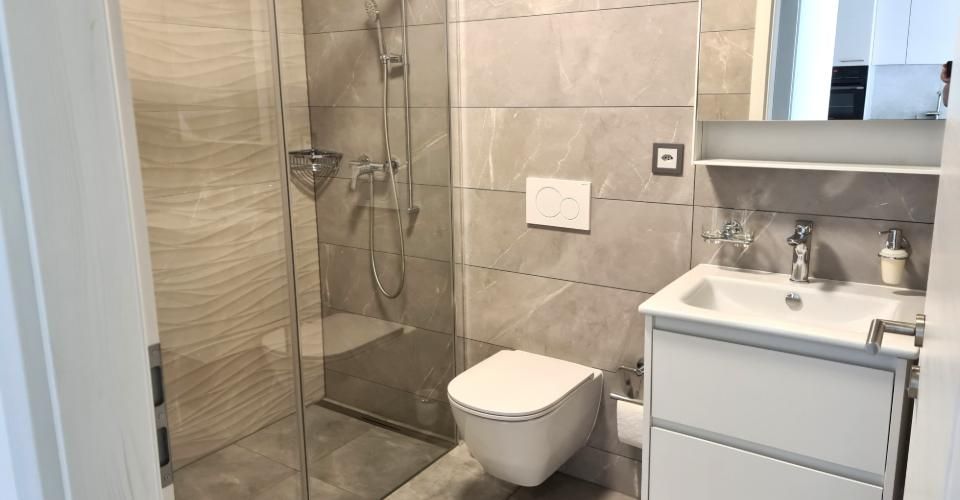 A louer magnifique appartement de 2.5 pièces avec une terrasse couverte de 19,70 m² dans un immeuble résidentiel haut standing comme neuf avec place de parc dans le garage - Appartement 2.5 pièces - image - 10