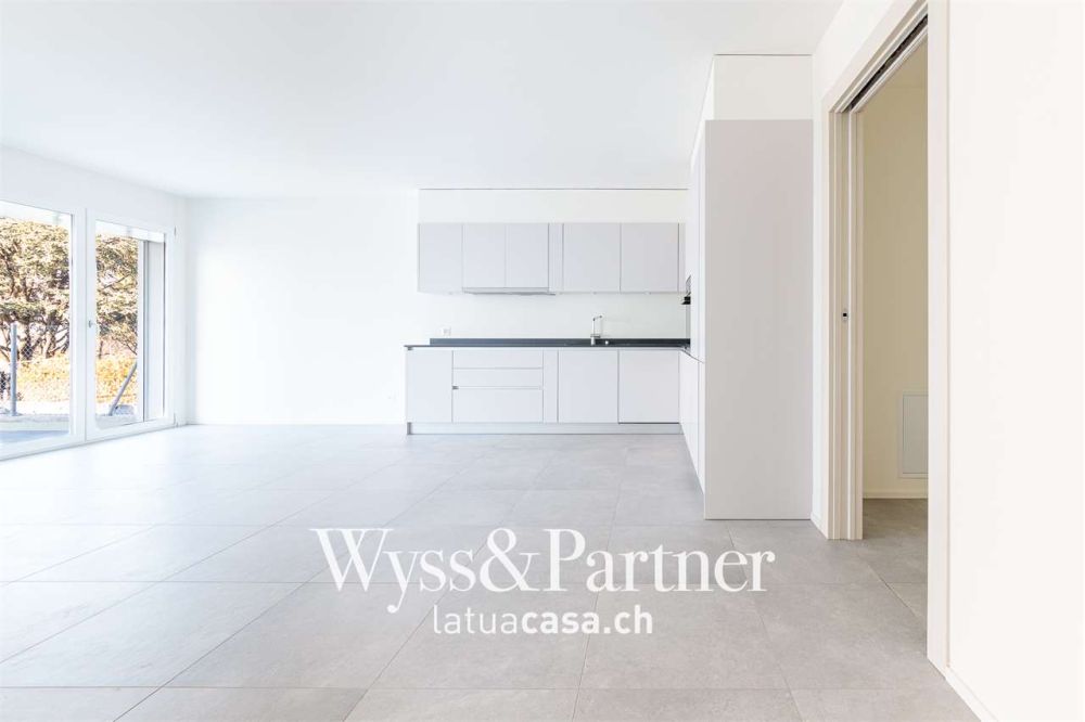 Claro, nuovo appartamento 3.5 con giardino - Bild 2