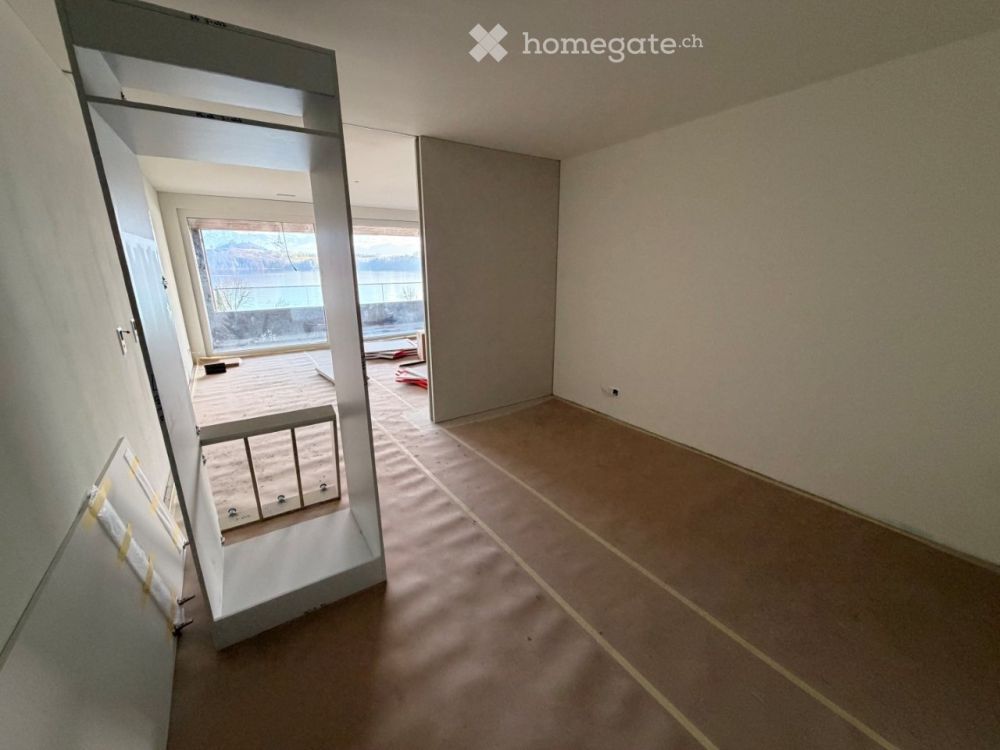 Loftartige Wohnung mit Balkon und Sicht auf den See und das Bergpanorama - Bild 9