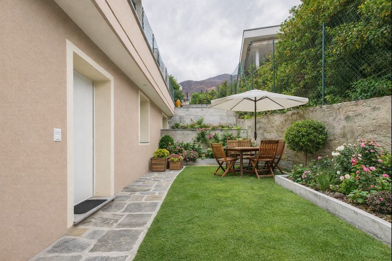 NUOVA COSTRUZIONE:APPARTAMENTO DI 3,5 LOCALI CON GIARDINO E POSTO AUTO - Bild 2