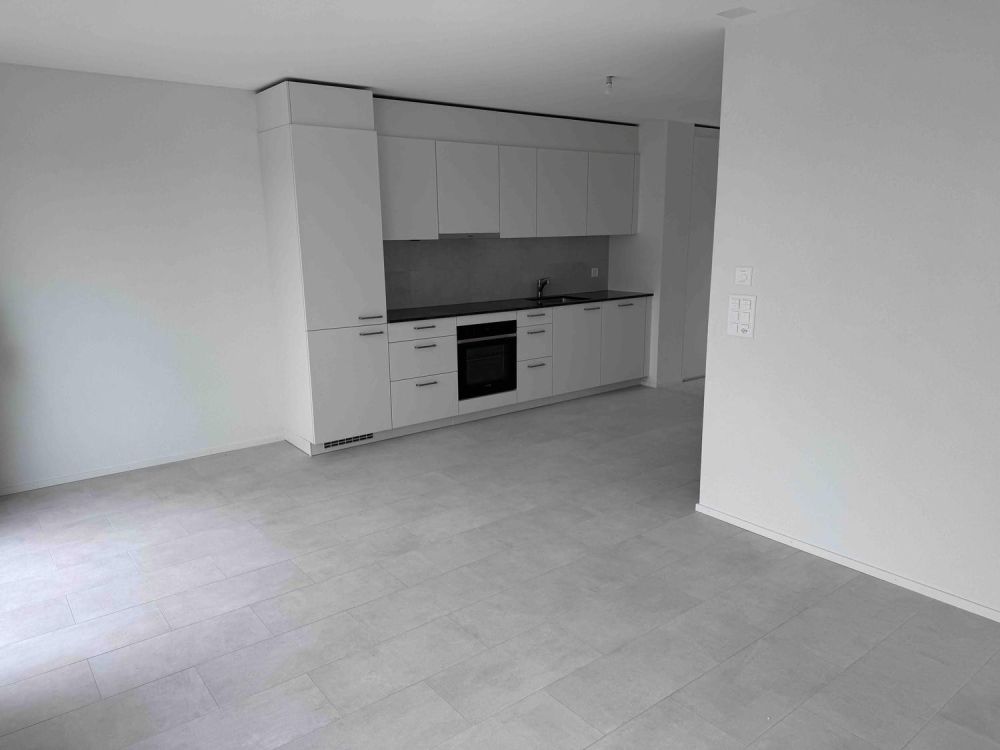 À louer Appartement neuf de 2,5 pièces avec balcon / parking intérieur - Bild 4