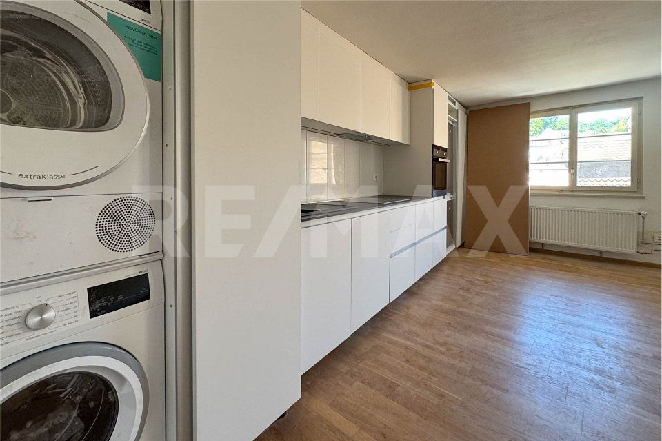 Erstbezug! Charmante 3-Zimmer-Wohnung mit direkter Rheinsicht - Bild 3