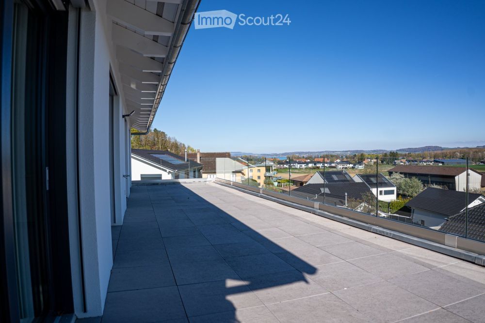 Exklusiv 5,5 Zimmer-Wohnung in Villa mit Blick auf den See und die Berge - Bild 6