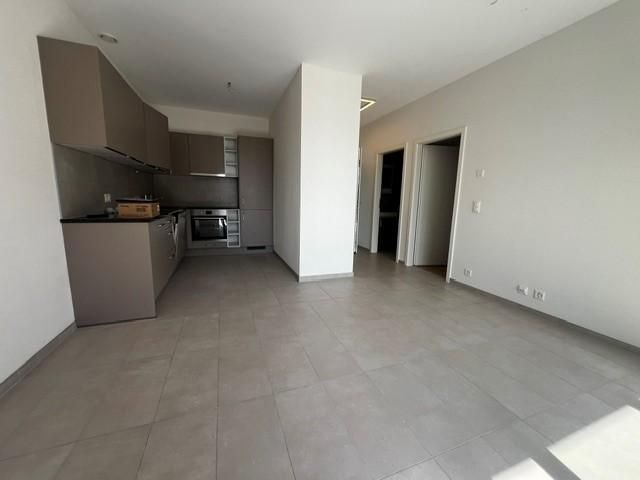Magnifique appartement de 2,5 pièces au rez-de-chaussée, offrant une spacieuse terrasse ( G002 ) - Appartement 2.5 pièces - image - 1