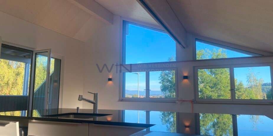 3.5Zi Maisonette Wohnung zu vermieten - Wohnbereich mit Panoramafenstern