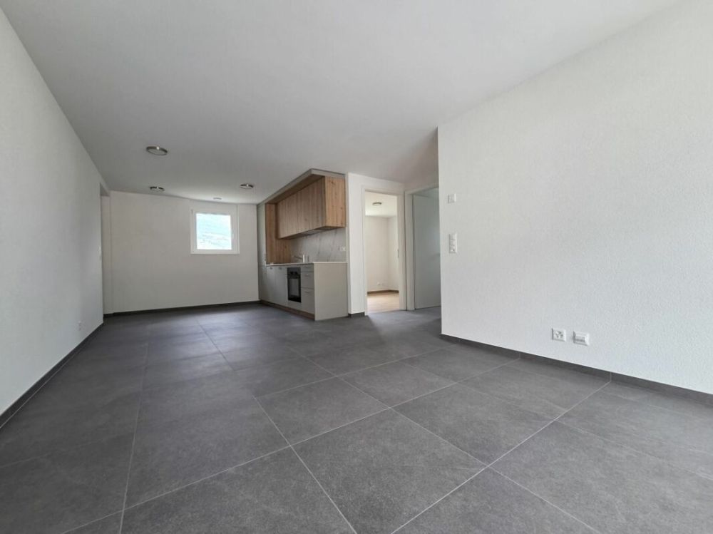 Neuf - Appartement de 3.5 pièces avec balcon et places de parc - Bild 3