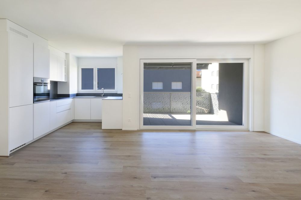 Moderno 4.5 locali con terrazza e lavaderia privata - Bild 1