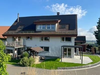 Angebauter Hausteil mit Terrasse & Kachelofen - Bild 1