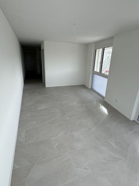 Attikawohnung mit sonnigem Balkon - Wohn / Essbereich