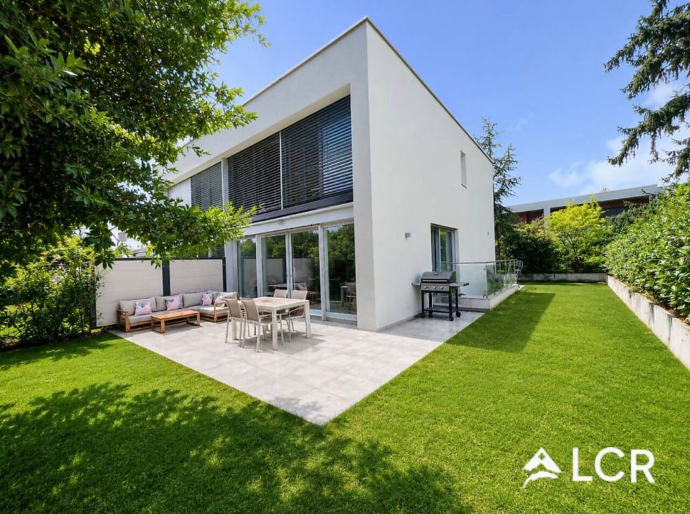Superbe maison Minergie 6 pièces avec jardin et sous-sol aménagé à Thônex - Bild 1