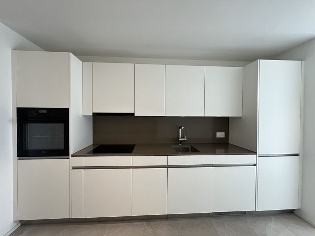 Attikawohnung mit sonnigem Balkon - Küche