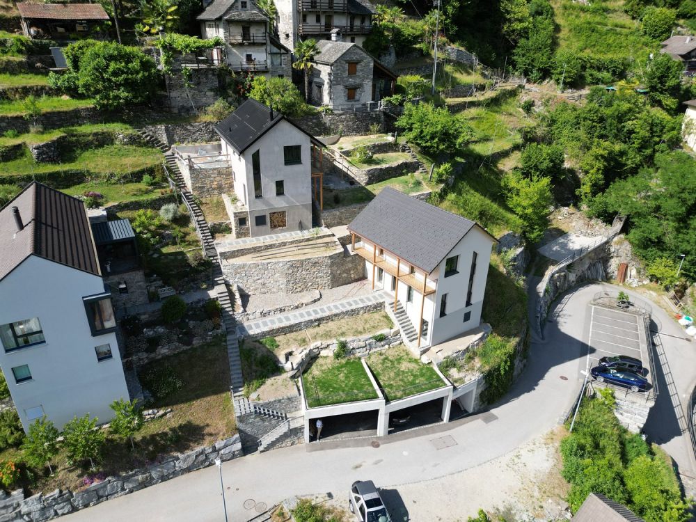 Casa unifamiliare con terreno e posti auto coperti - Bild 3