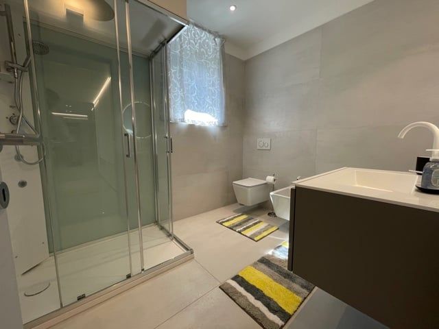 PARADISO FRONTE LAGO - 4,5 LOCALI DI NUOVA COSTRUZIONE ARREDATO - Bild 7