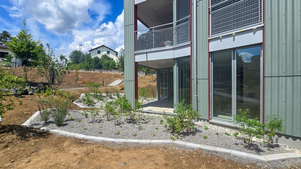Sonnige 2.5 Zimmer-Gartenwohnung im Neubau - Bild 1