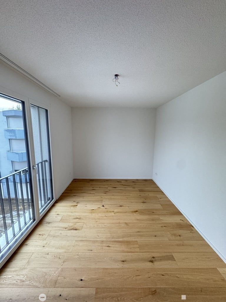 grosszügige 4.5-Zimmer-Neubauwohnung im 1. OG, ca. 111.6m2 - Zimmer_links.jpg