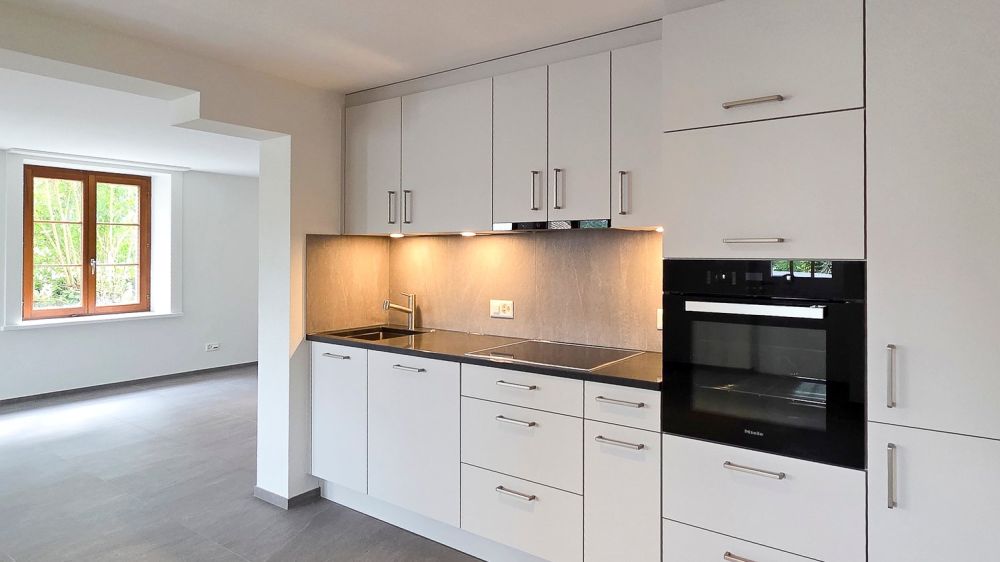 Charmante Wohnung mit Sitzplatz – Erstvermietung nach Totalsanierung - Bild 8