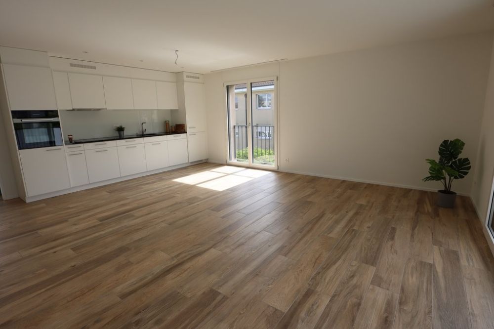 Moderne Gartenwohnung mit eigener Waschküche - Wohnzimmer