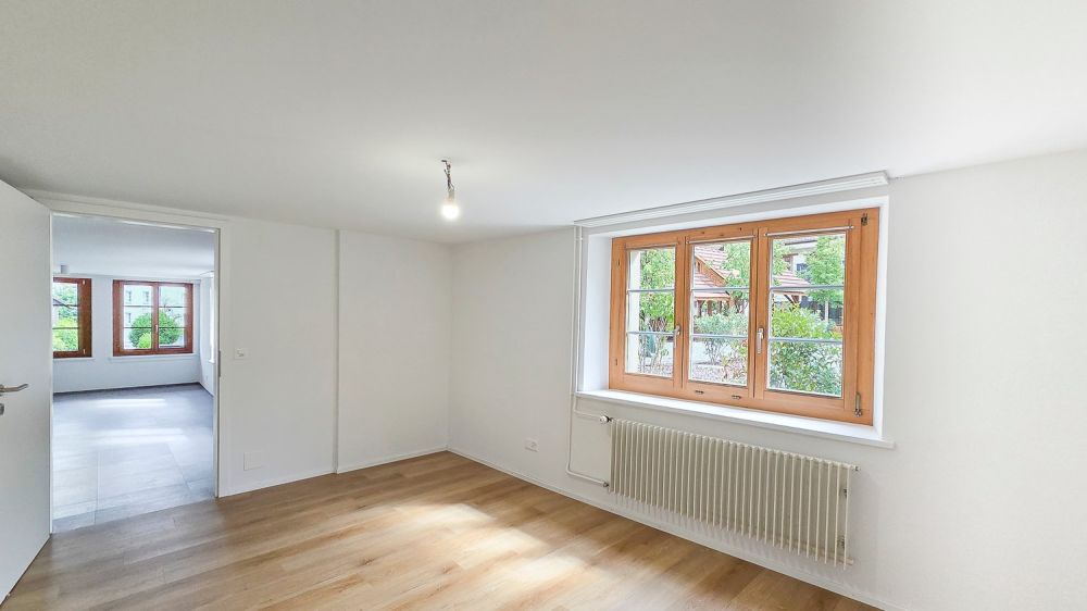 Charmante Wohnung mit Sitzplatz – Erstvermietung nach Totalsanierung - Bild 6