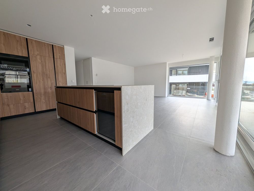 Magnifique appartement de 4,5 pièces avec jardin et finitions haut de gamme - Bild 1