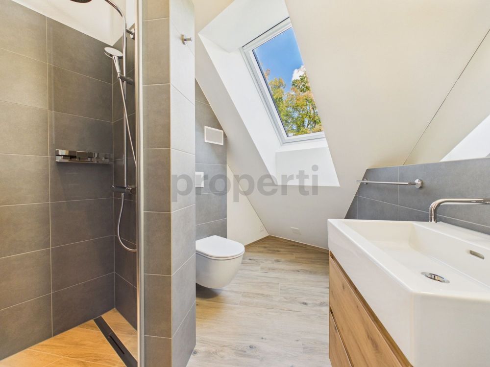 Attikawohnung direkt am Waldrand mit Zürichseeblick, Minergie-Standard und Free-Cooling - Image 9