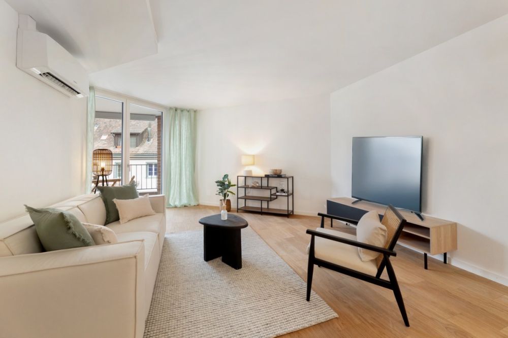 Klimatisierte 2.5 Zimmerwohnungen mit Concierge, Fitness und Pool - Wohnzimmer