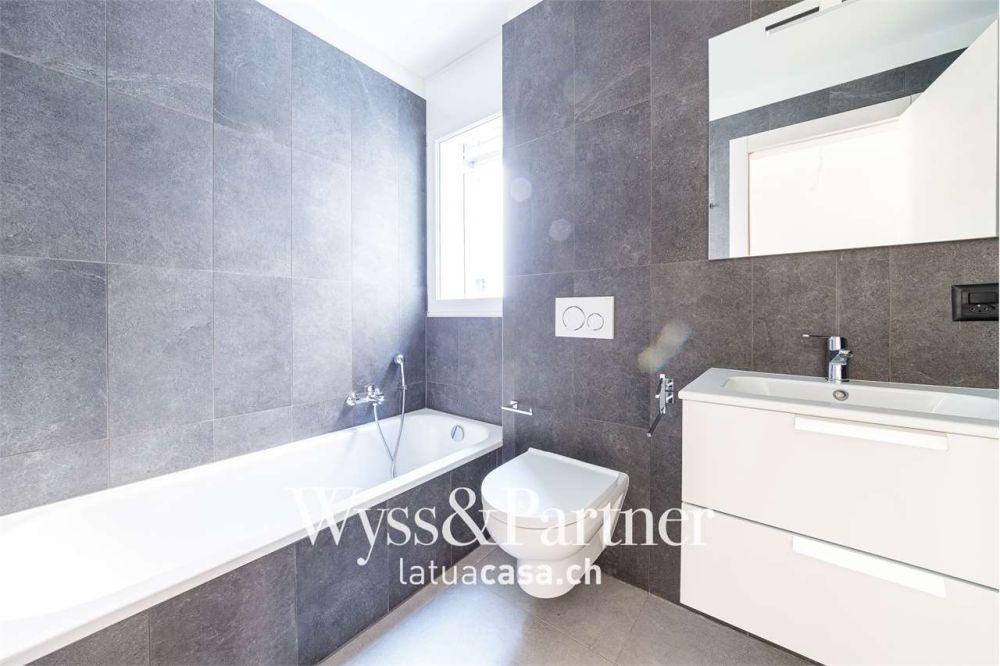 Claro, nuovo appartamento 3.5 con giardino - Bild 6