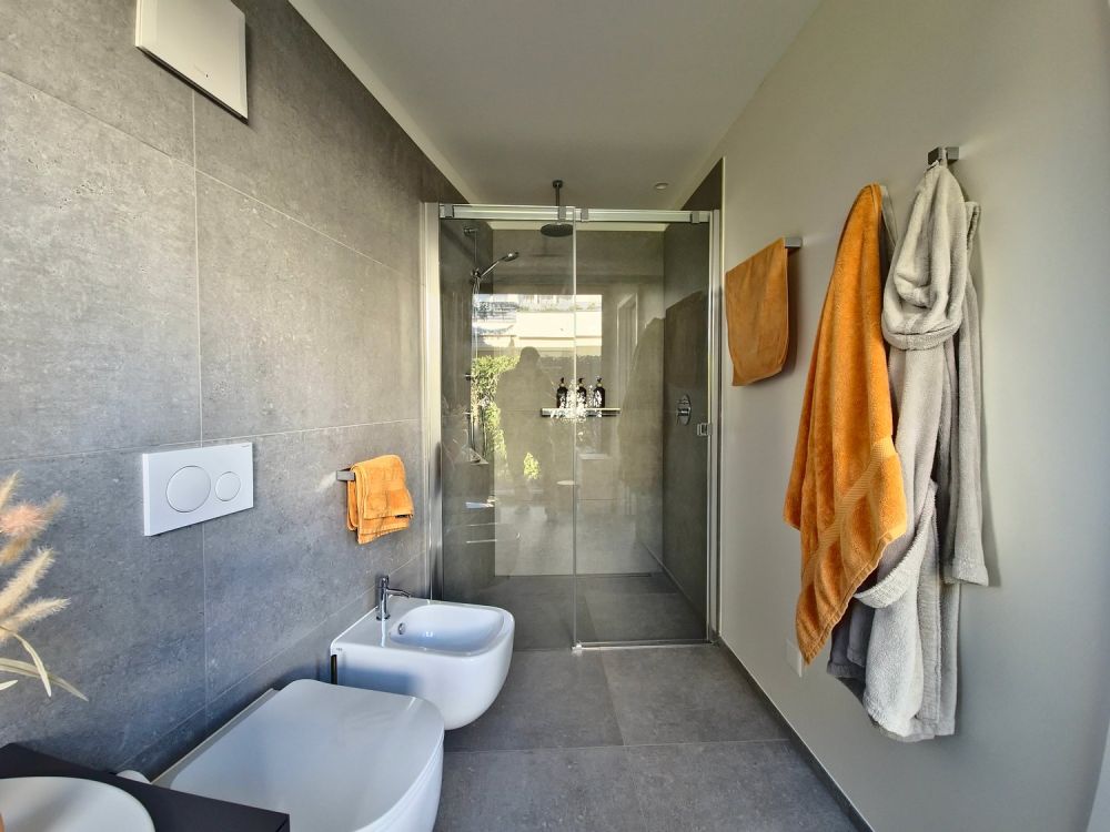 ESCLUSIVO 4.5 LOCALI AL PIANO TERRA CON GIARDINO PRIVATO A GENTILINO - Bild 12