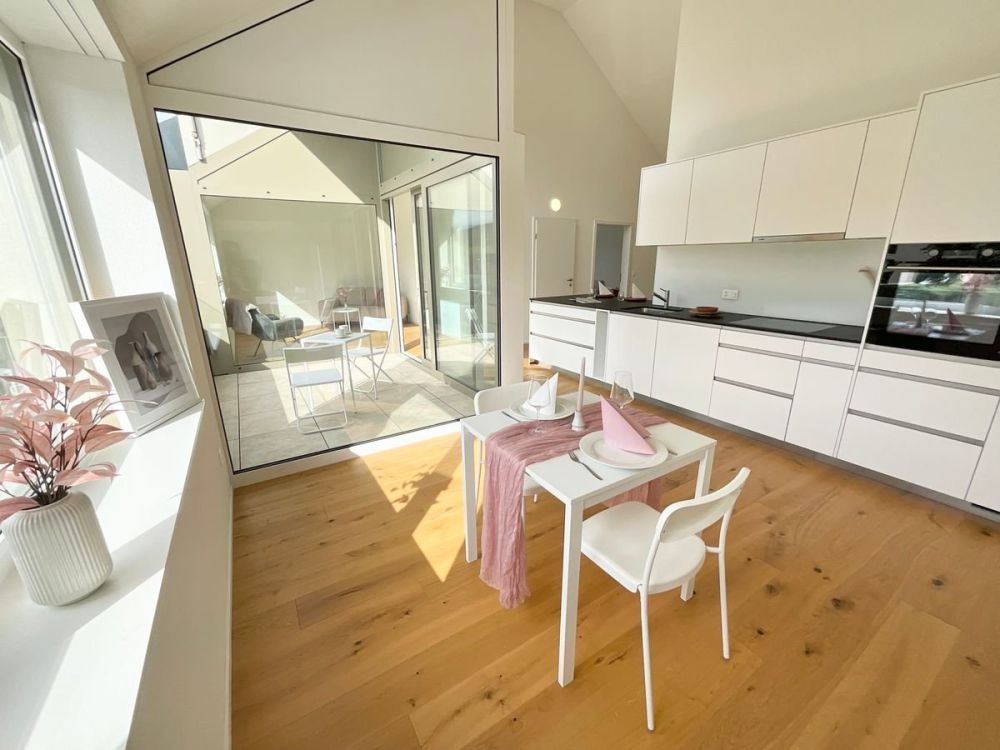 Appartements neufs de 3.5 pièces avec loggia - Immeuble moderne et écologique au coeur du village - Bild 1