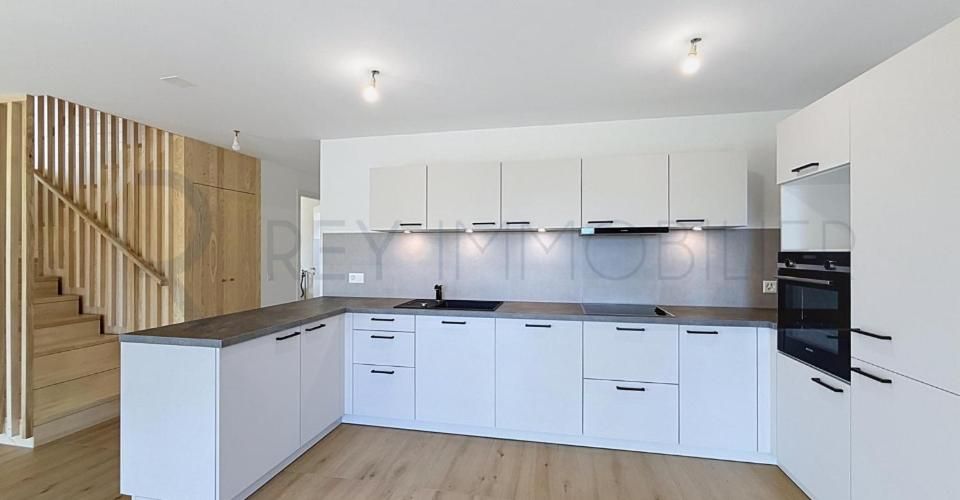 Triplex neuf dans villa avec terrasse et jardin - Appartement 5.5 pièces - image - 2