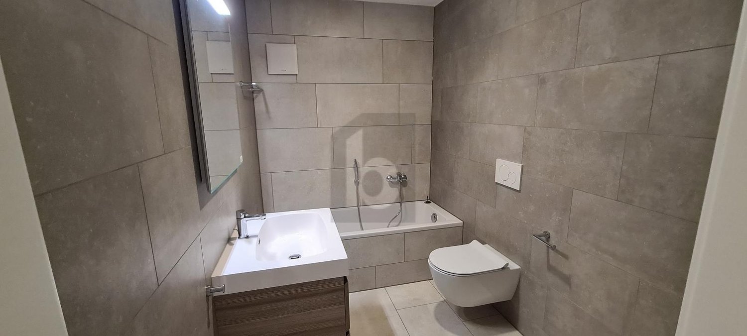 NEUF AU CALME PROCHE DU CENTRE - Bild 2