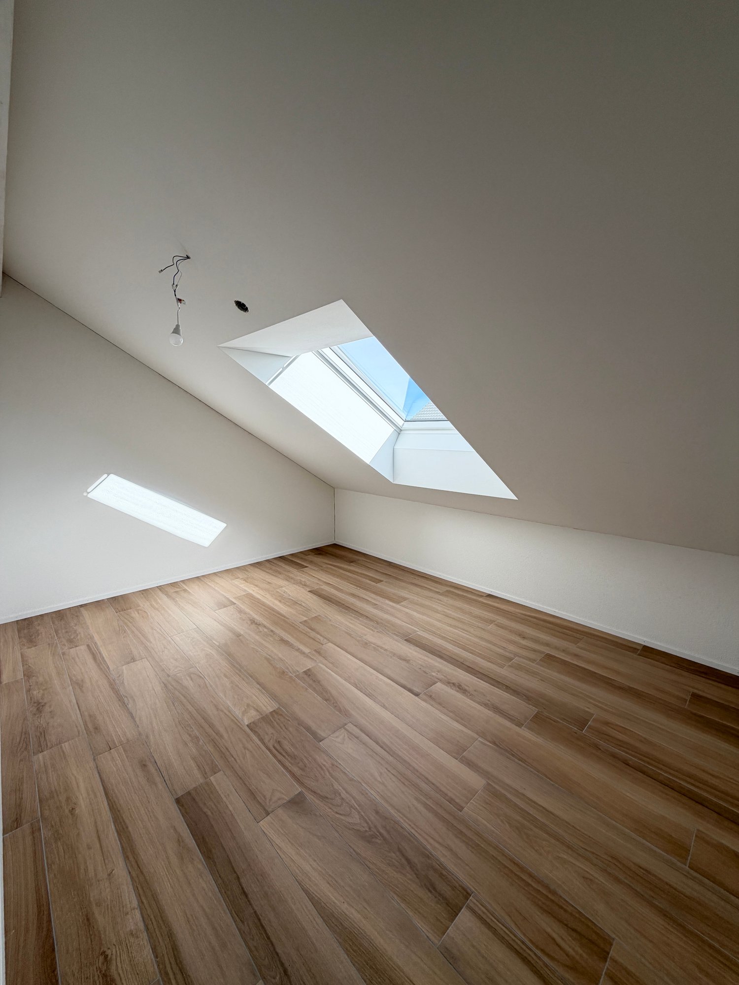 Exklusive 3.5-Zimmer-Dachgeschosswohnung im Neubau – 103 m² mit viel Licht & Charme - Schlafzimmer 1