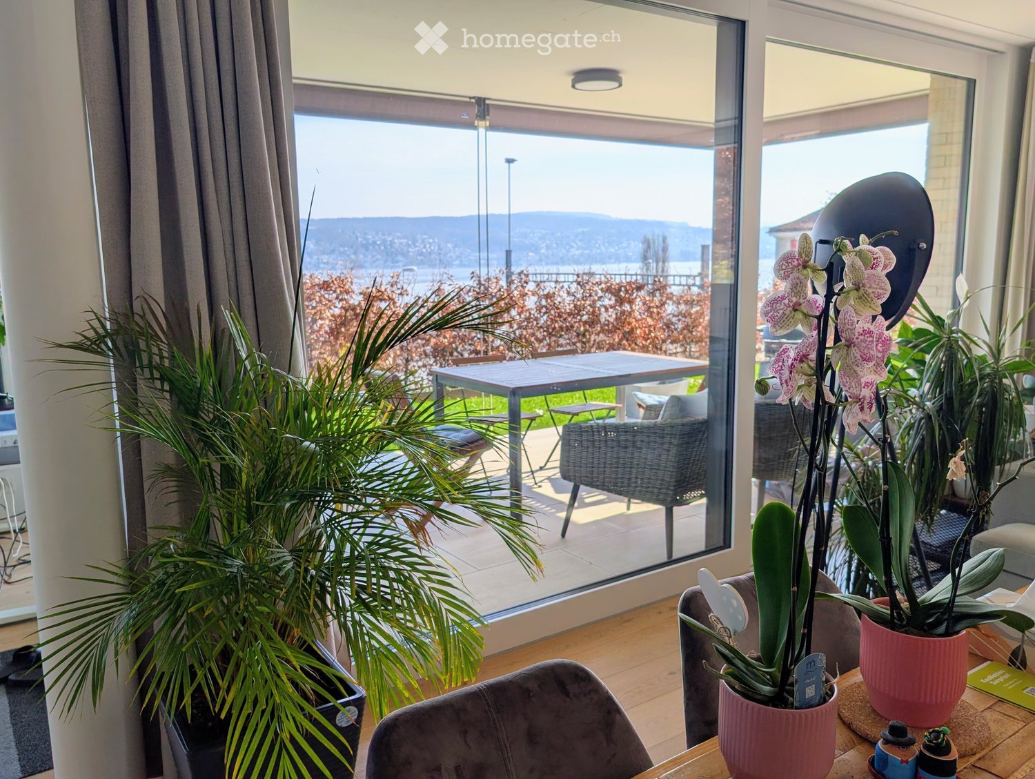 Exklusive 3.5-Zimmer-Gartenwohnung mit Seesicht in Kilchberg - Bild 1