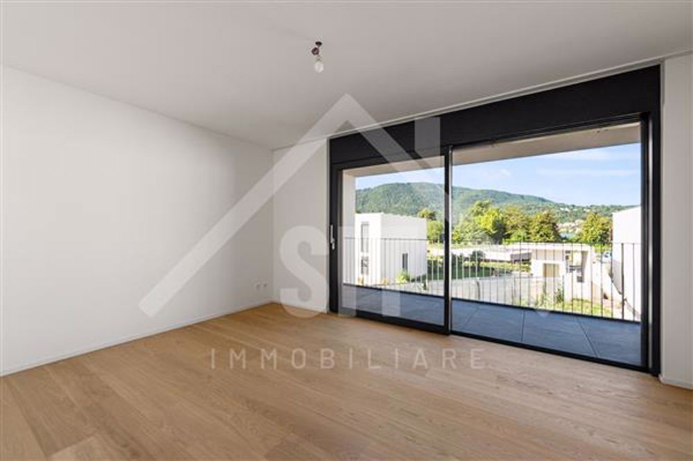 Caslano: Casa a schiera 3.5 locali - Camera