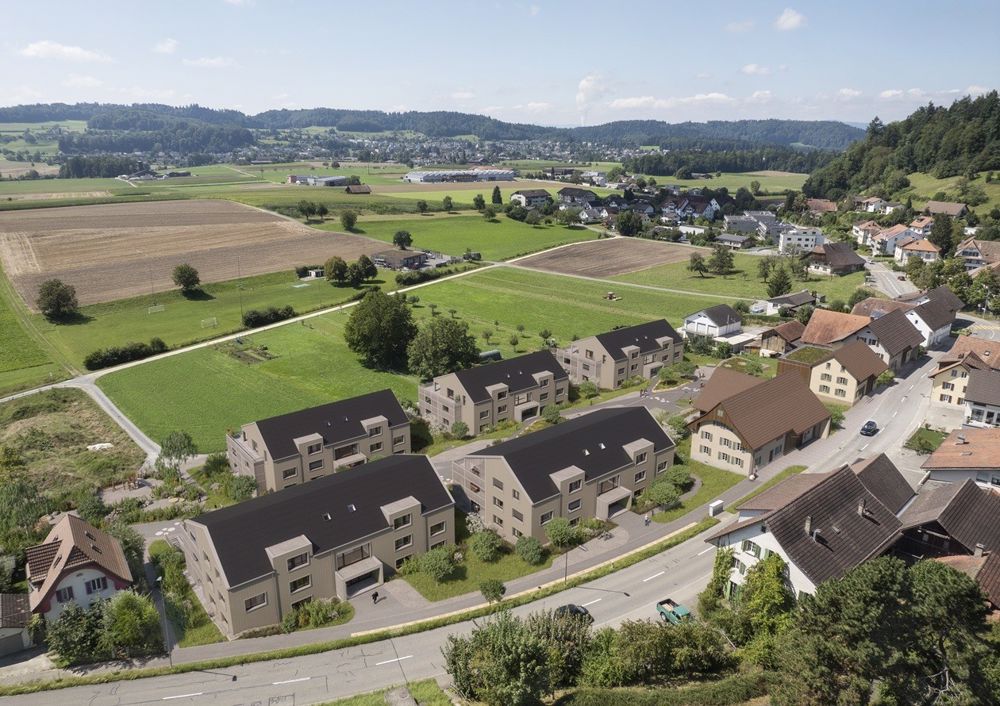 Erstvermietung Überbauung Hostez - im Dorf dihei - Drohnenbild