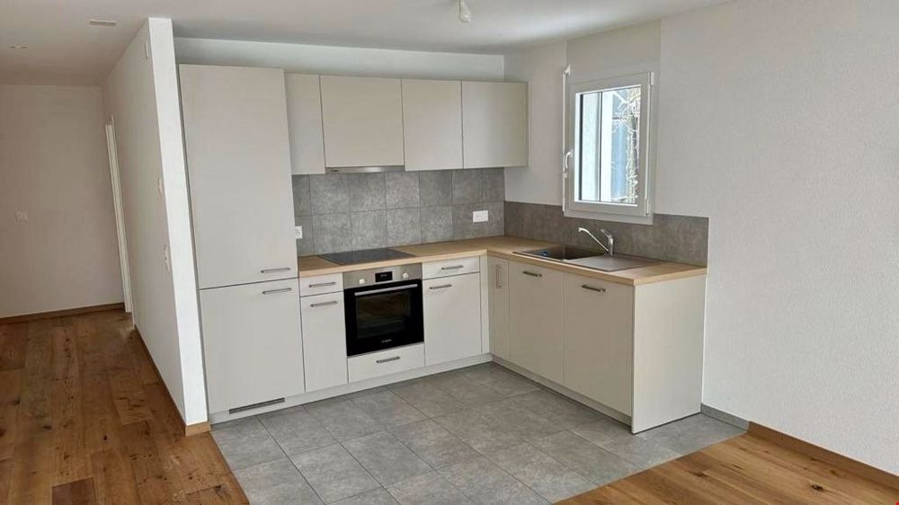 A louer 3.5 pièces au rez-de-chaussée avec jardin - 1er loyer offert - Bild 2
