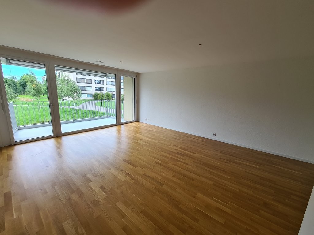 Moderne Wohnsiedlung an verkehrsgünstiger Lage - Musterfoto Wohnzimmer