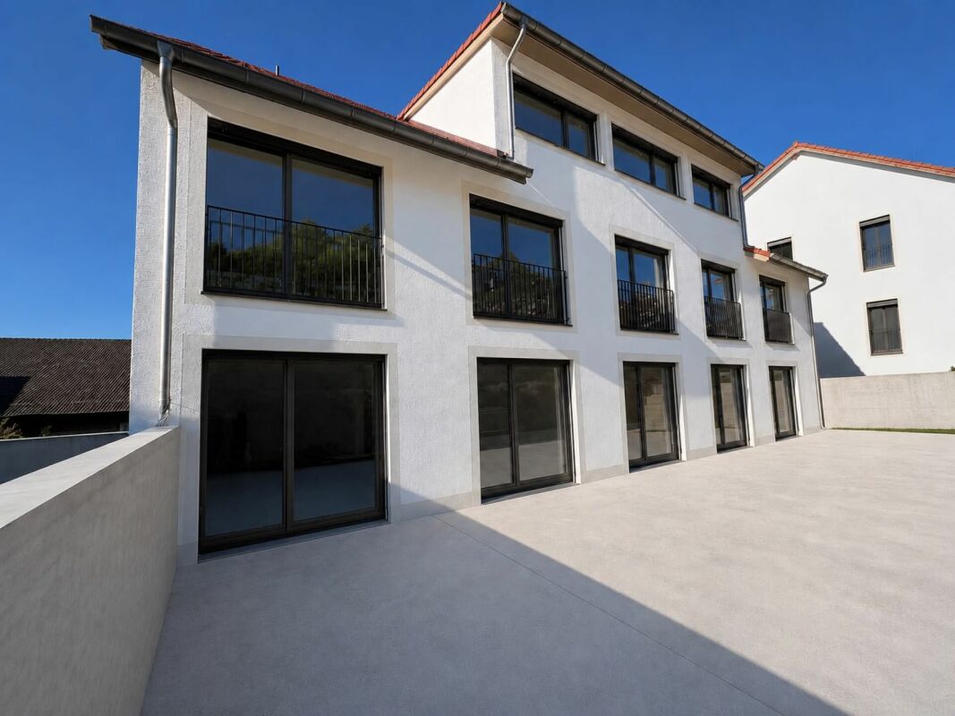 Neubau 3.5 Zimmer-Wohnung mit Tiefgarage 1. OG - Bild 2
